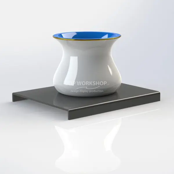 Low-profile black acrylic riser with vase on top, perfect for retail display or exhibitions.