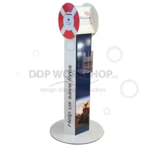Tall freestanding charity donation box with integrated leaflet pocket and round base, featuring Lifeboat branding.