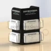 Three-sided black acrylic business card holder with clear pockets, perfect for countertop or reception display.