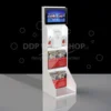 White freestanding digital display stand with a screen, literature holders, and a built-in collection box.