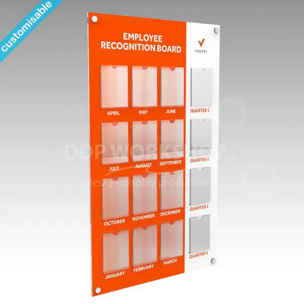 Employee Recognition Display Board with 12 clear acrylic portrait pockets for monthly winners and 4 additional pockets for quarterly achievers, featuring custom branding and wall-mounted design.