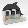 Frosted acrylic bathroom toiletries tray with a black dolphin-shaped back panel, holding three miniature bottles.