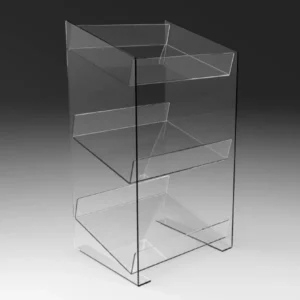 Clear acrylic 3-tier display stand with open front and back risers, ideal for organizing confectionery or small retail items.