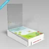 Customisable acrylic magazine holder with a stack of colorful magazines and an A4 clear header pocket displaying promotional graphics.