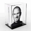 Clear acrylic display case housing a book with black base, designed for protection and presentation.