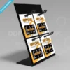Black acrylic countertop display stand with four eurohooks showcasing orange and white gift cards arranged in a 2x2 grid.