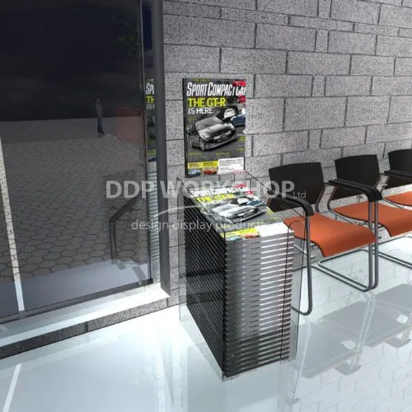 Perspex dump bin filled with magazines in a modern waiting room