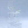 Clear acrylic 2-tier tabloid pick-up display stand designed for showcasing magazines or promotional materials.