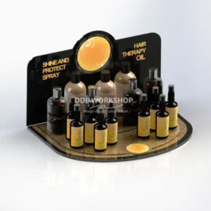 Acrylic cosmetic counter display stand showcasing bottles of hair care products with bold black and yellow branding.