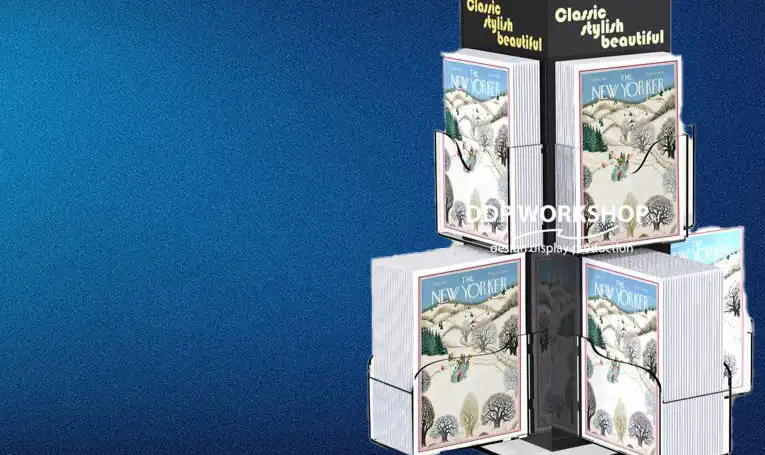 Rotating card display stand showcasing "The New Yorker" greeting cards, designed by DDP Workshop with wire frame pockets and a black central pillar.